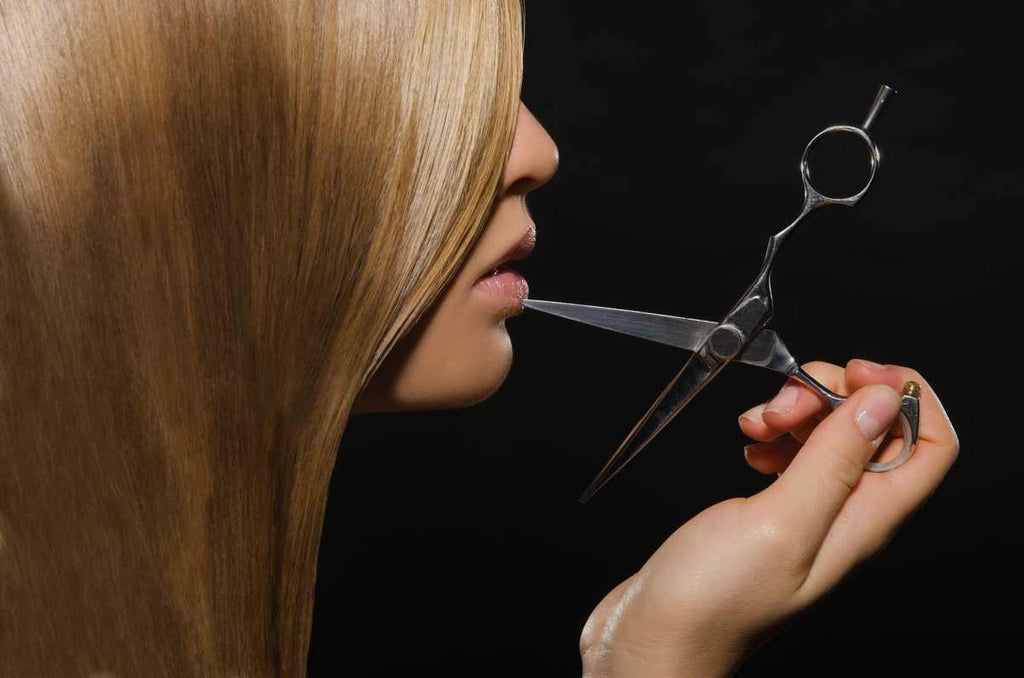 Scissors Cutting Hair Off 11 Ways For Women To Grow Out A Bad Haircut