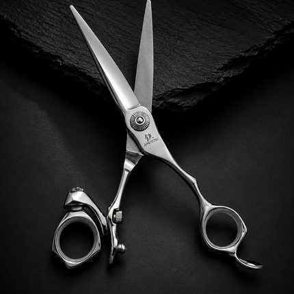 Juntetsu Swivel Offset hair cutting scissor on dark background