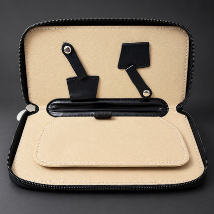 Inside the Ichiro Shears Professional Travel Case: press-stud scissor straps, blade sleeves and a padded centre divider